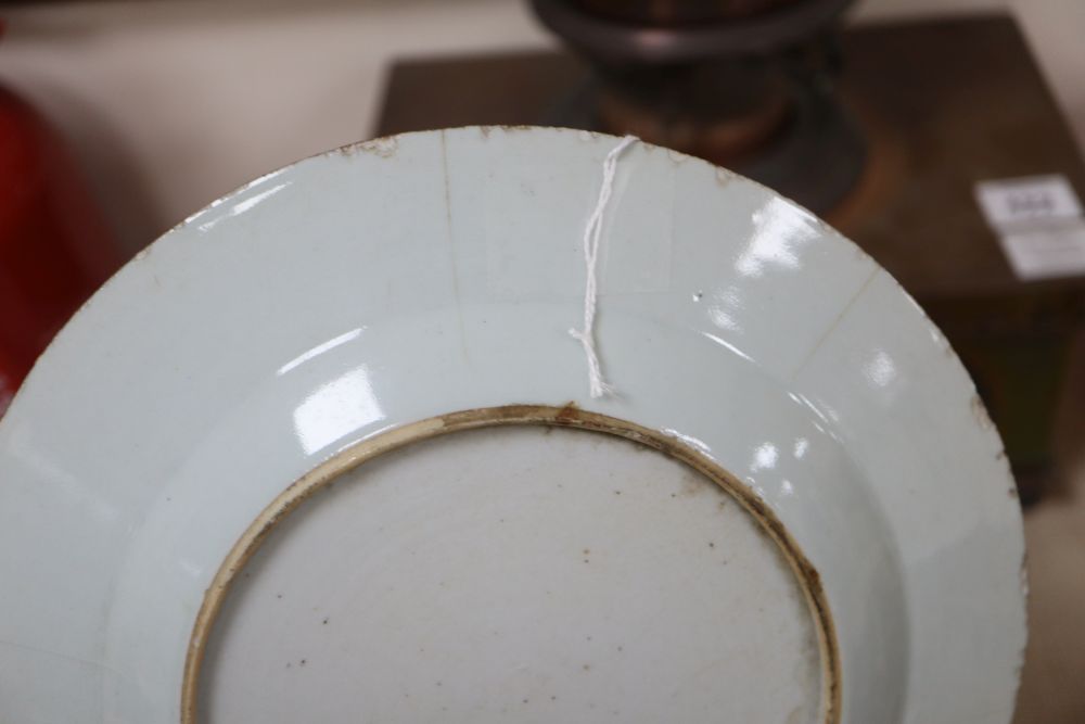 A collection of Oriental chargers and plates,